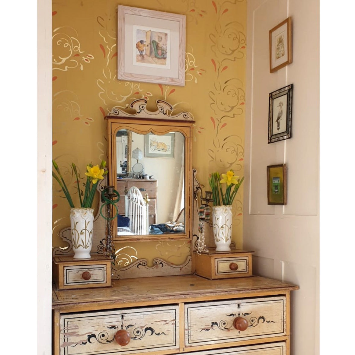 Yellow wallpaper with dressing table